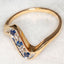 Elegant 10k Yellow Gold S-Curve Sapphire and Diamond Ring - Size 7