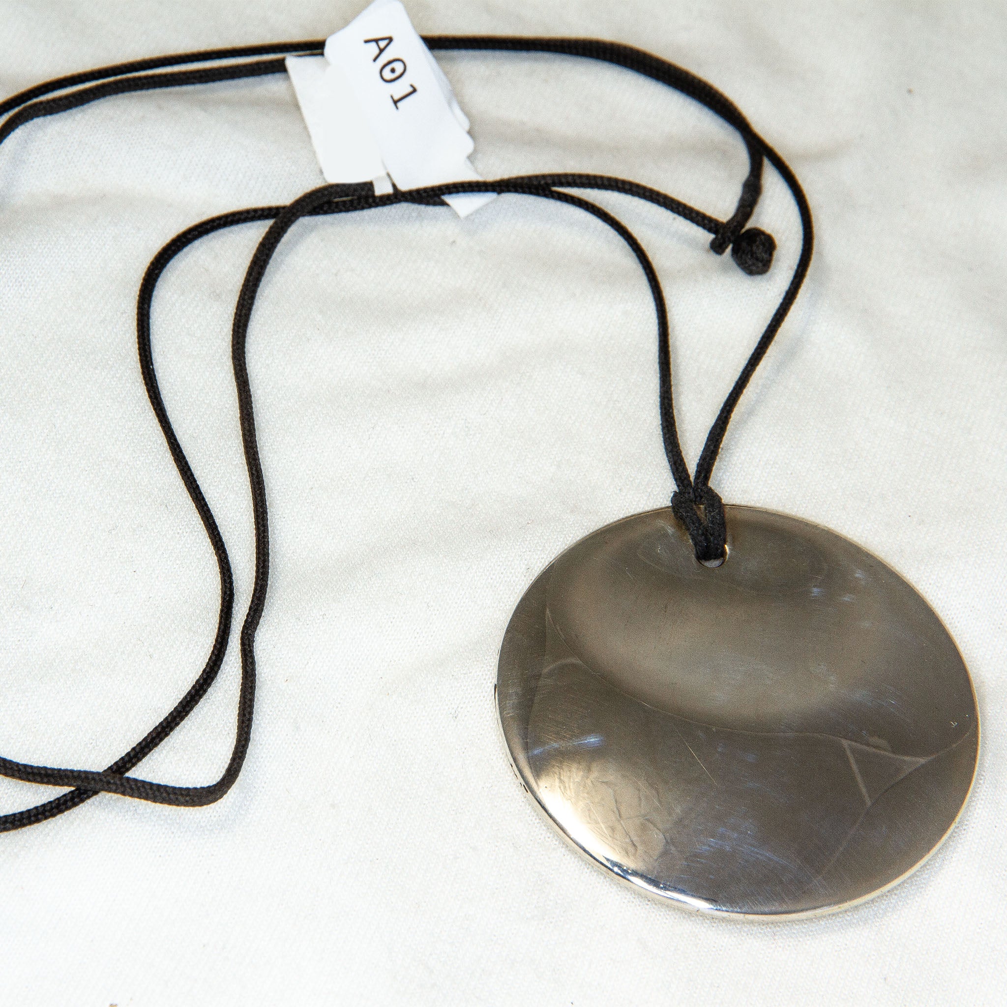 Authentic Tiffany & Co. Elsa Peretti 2" Silver Round Disc Pendant on Black Cord - Pre-Owned