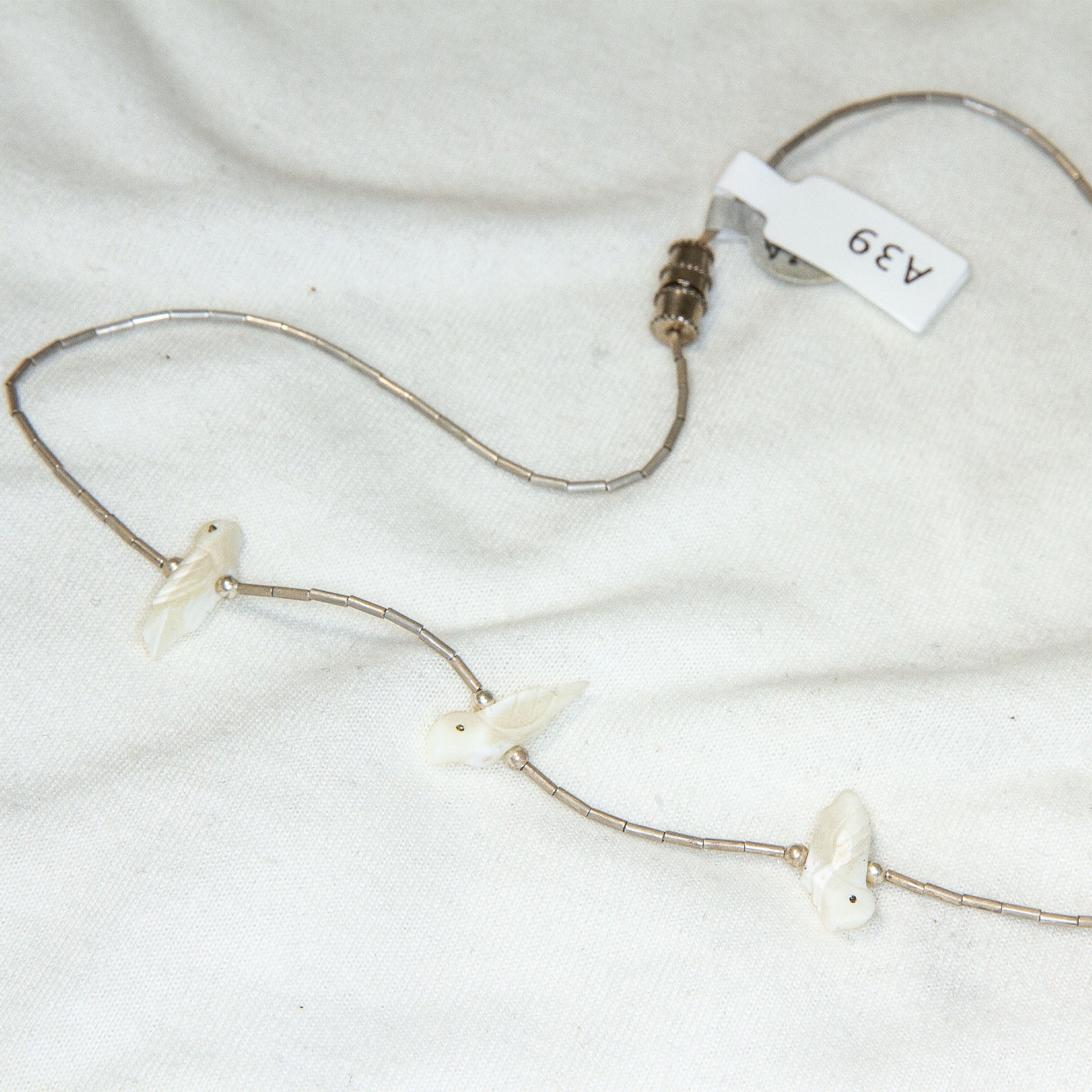 16" Liquid Silver & Carved Bird Bead Necklace Secondary image