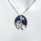 Sterling Silver Abstract Cutout Disc Pendant Necklace