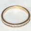 14K White Gold 0.13ctw Channel-Set Moissanite Band - Size 7