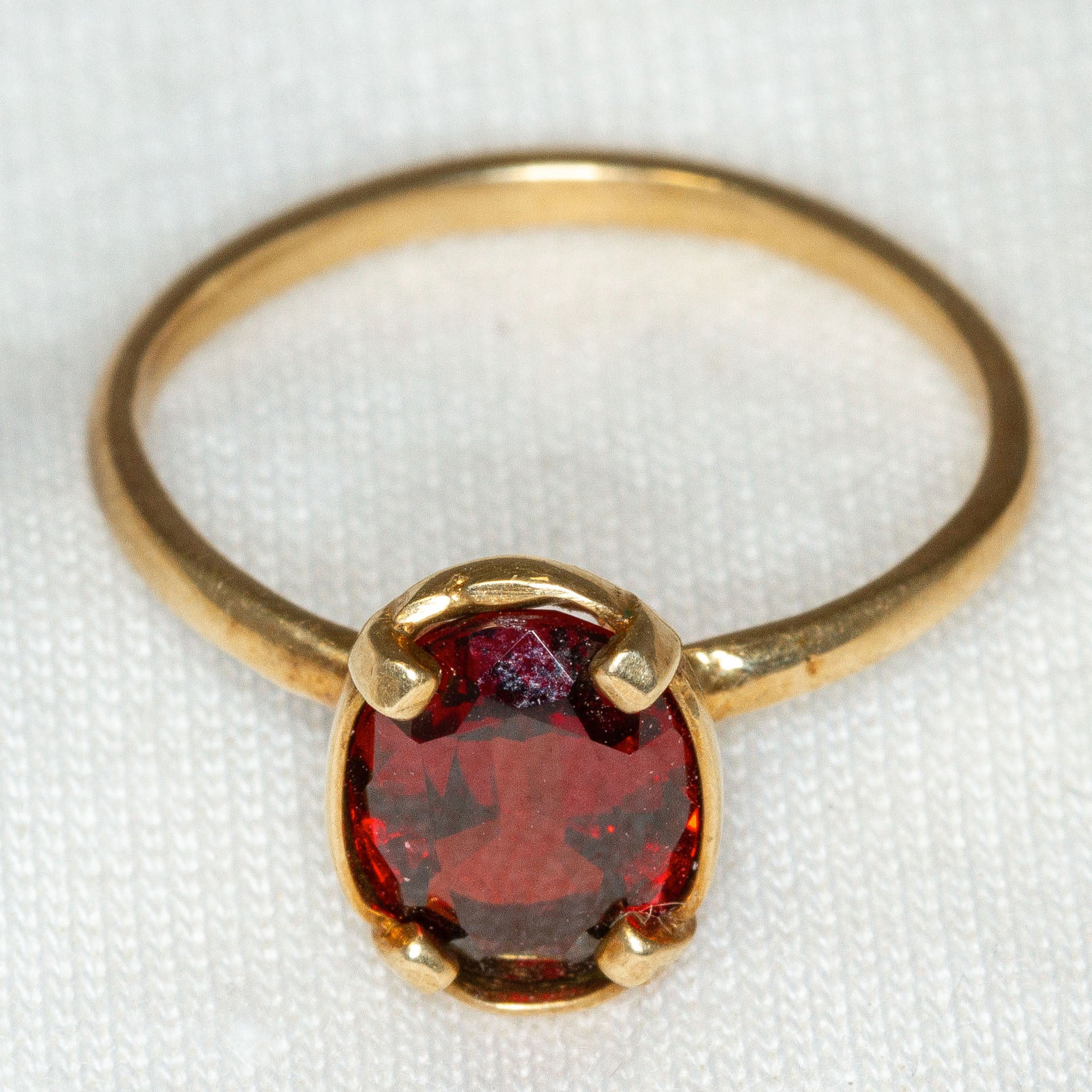 Yellow Gold 7x9mm Oval Dark Red Garnet Solitaire Ring - Size 5.5