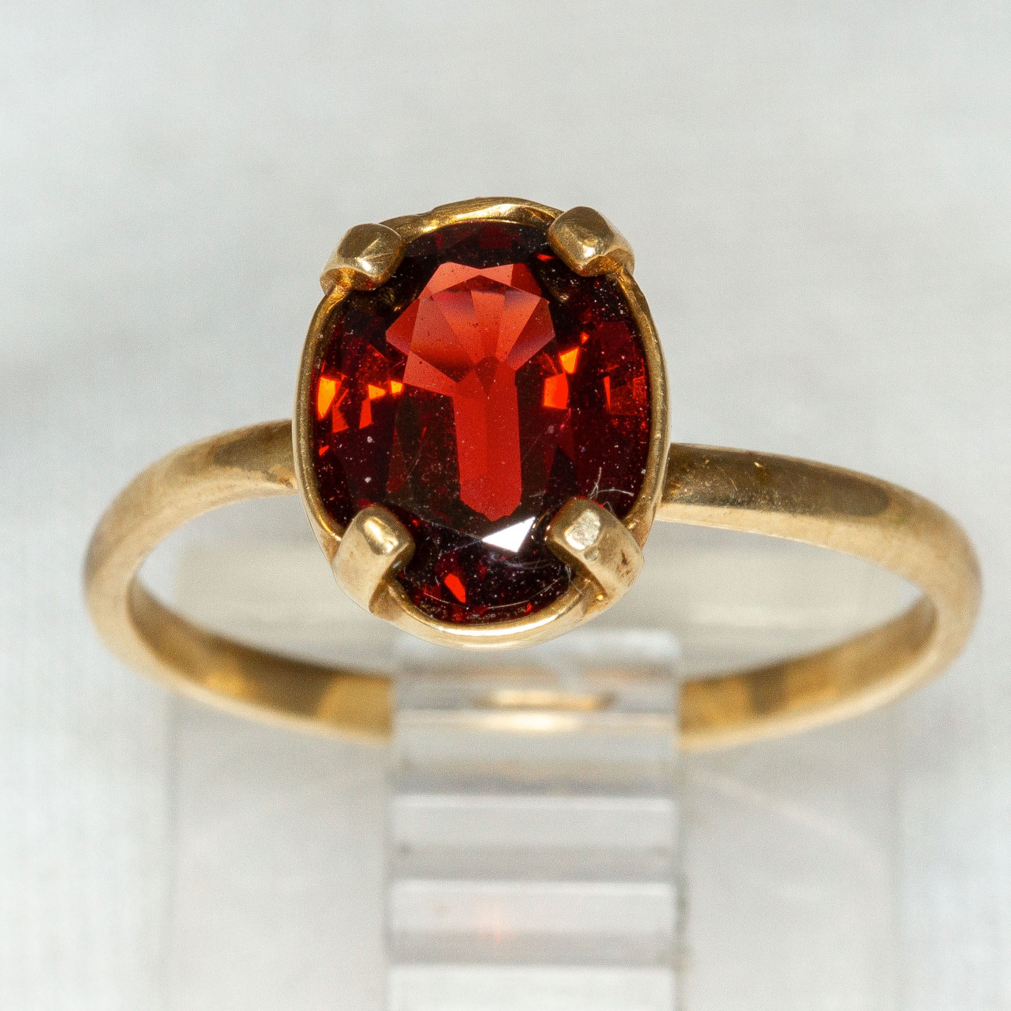 Yellow Gold 7x9mm Oval Dark Red Garnet Solitaire Ring - Size 5.5